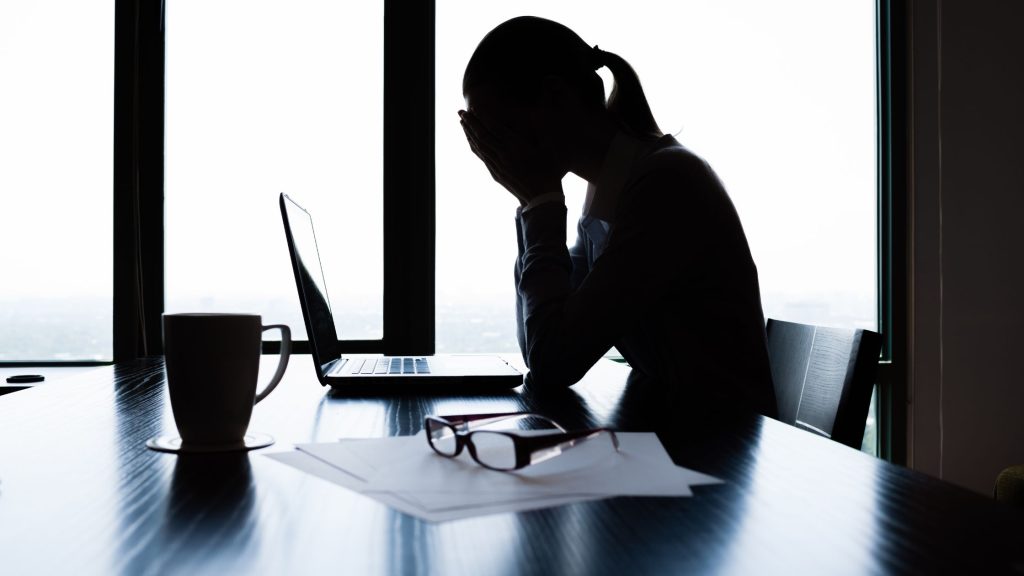 Woman experiencing stress affecting metabolic health and preventive medicine outcomes